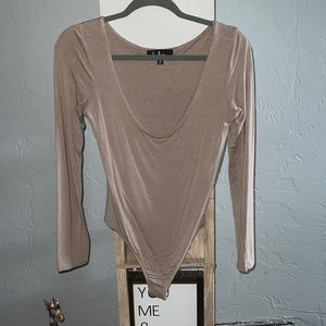 Lulu’s long sleeve thong body suit